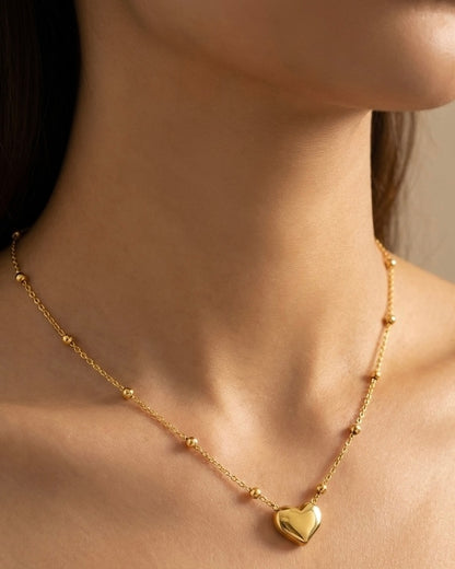 Gold necklace with a heart pendant